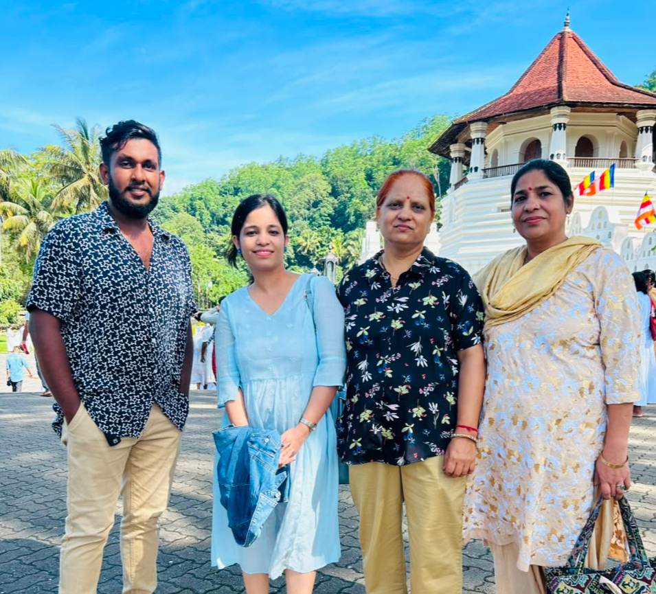 Family visiting the Temple of the Tooth in Kandy during a Sri Lanka family tour