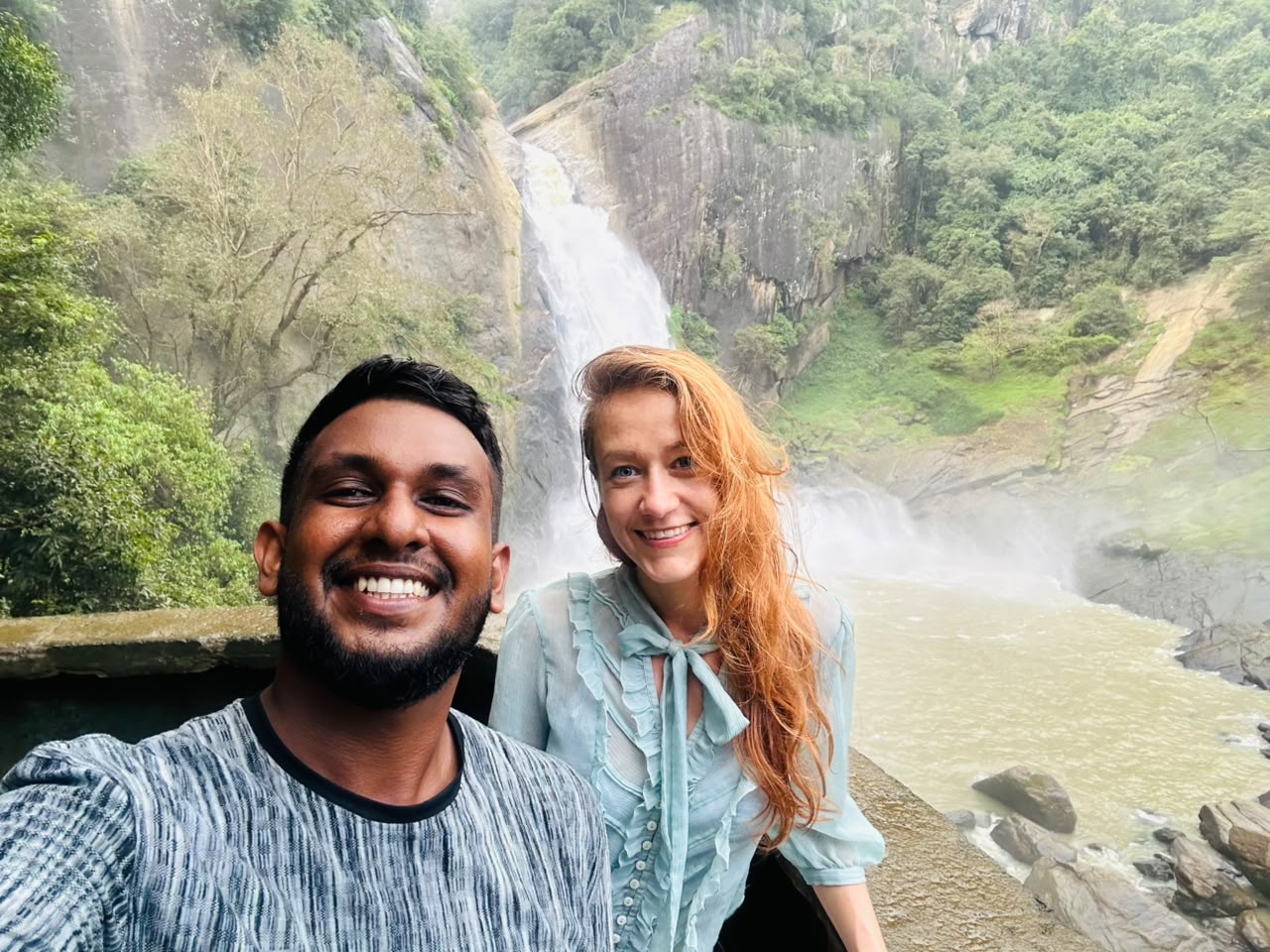 Traveller visiting a waterfall during a private Sri Lanka tour