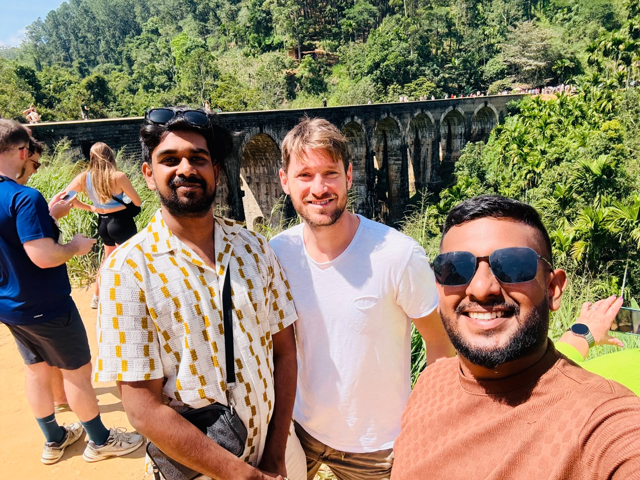 Travellers enjoying Nine Arch Bridge during a Sri Lanka hill country tour