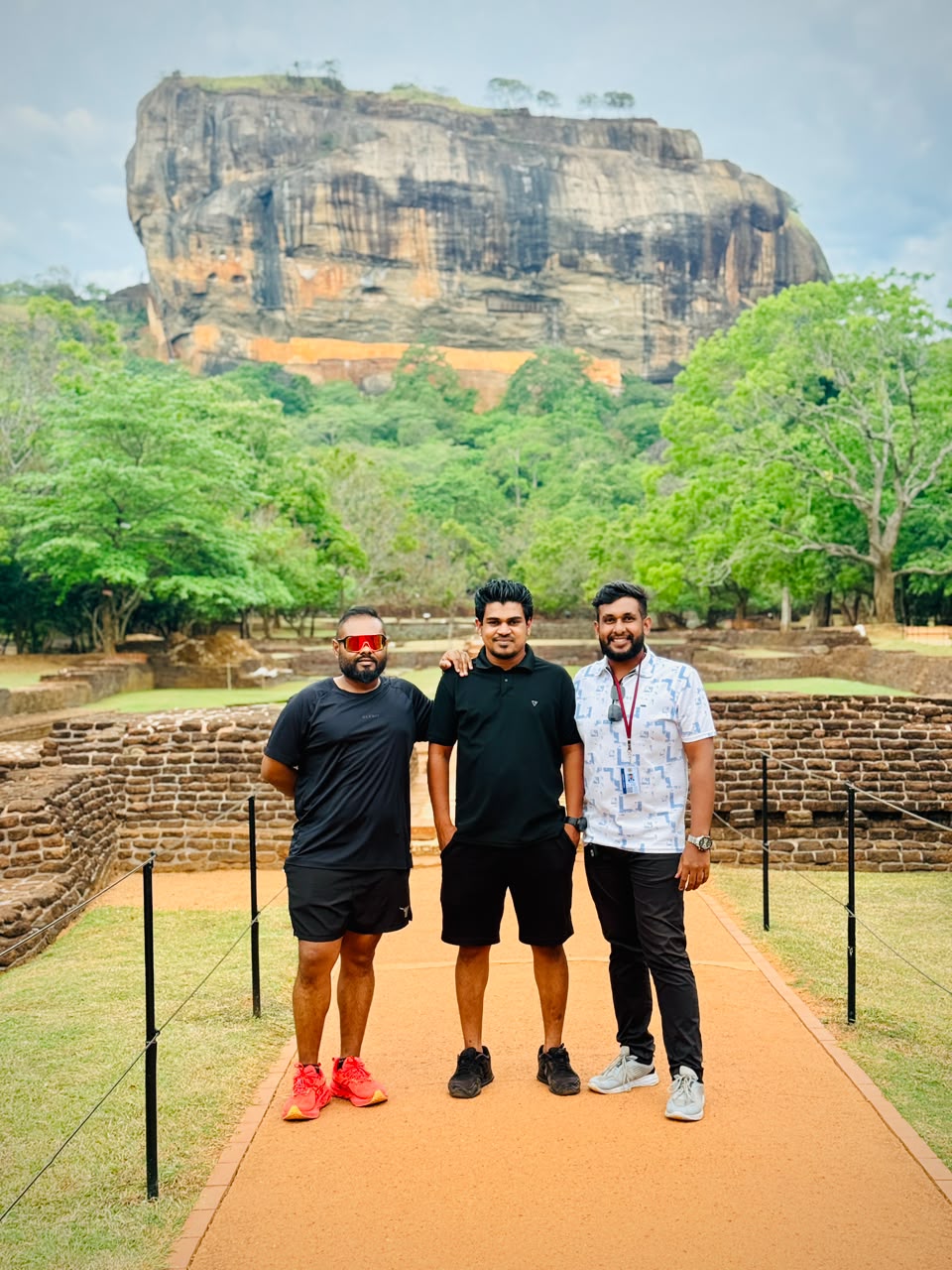 Travellers visiting Sigiriya during a Sri Lanka round tour